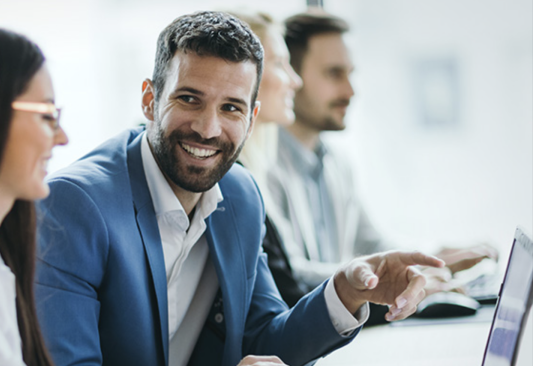 Man with woman at work discussing