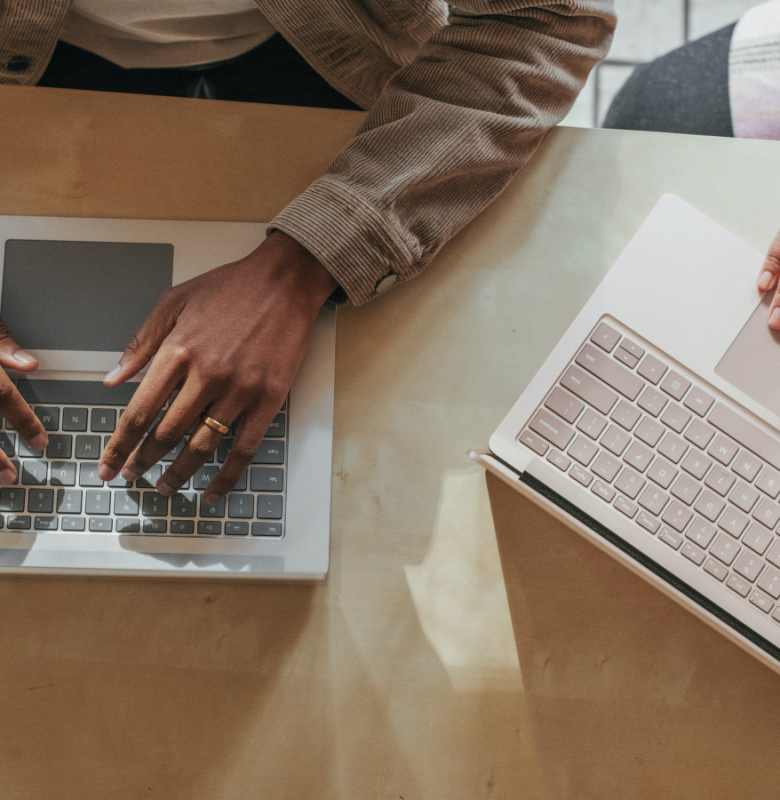 People typing on computers