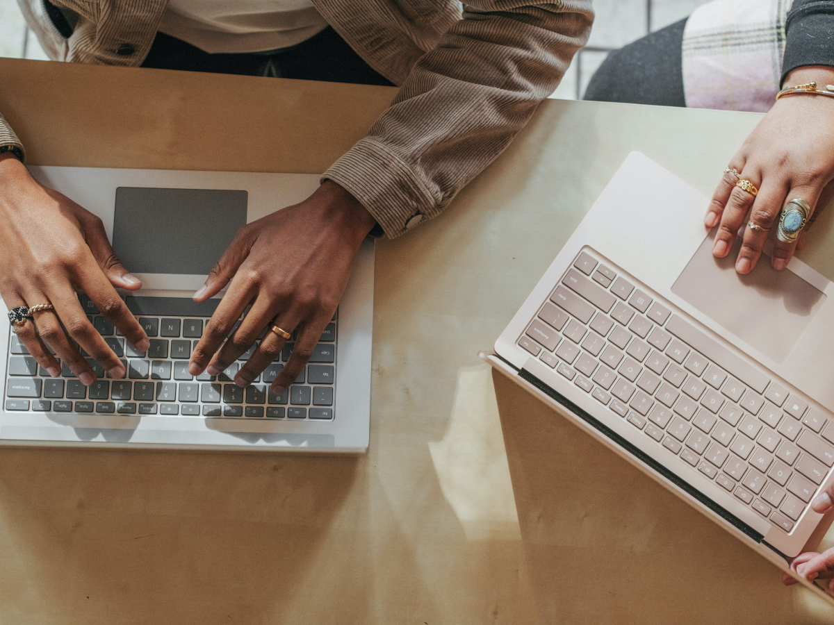 People typing on computers